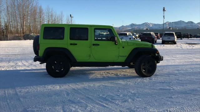 used 2013 Jeep Wrangler Unlimited car, priced at $22,700