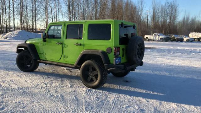 used 2013 Jeep Wrangler Unlimited car, priced at $22,700