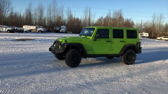 used 2013 Jeep Wrangler Unlimited car, priced at $22,700