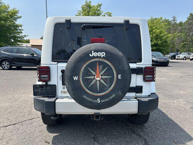 used 2014 Jeep Wrangler Unlimited car, priced at $14,500