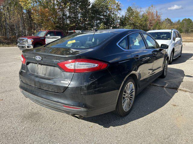 used 2015 Ford Fusion car, priced at $6,500