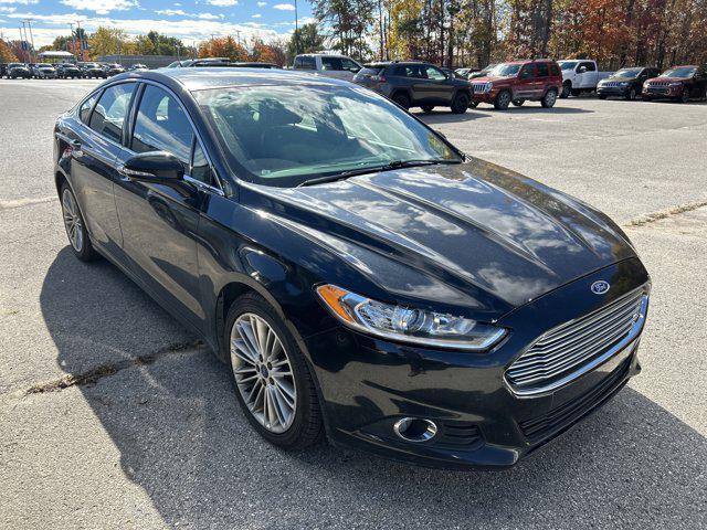 used 2015 Ford Fusion car, priced at $6,500