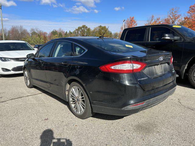 used 2015 Ford Fusion car, priced at $6,500