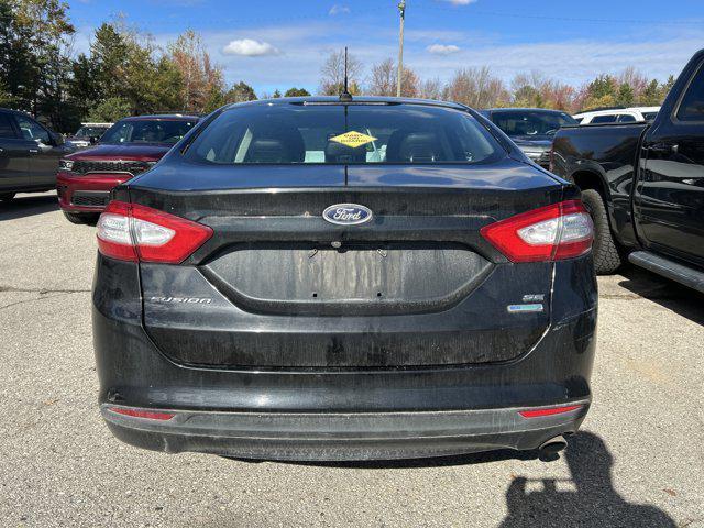 used 2015 Ford Fusion car, priced at $6,500
