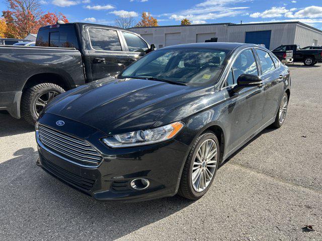 used 2015 Ford Fusion car, priced at $6,500