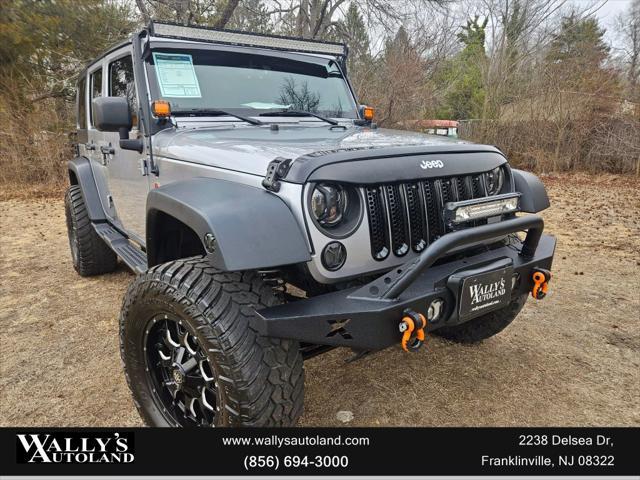 used 2013 Jeep Wrangler Unlimited car, priced at $13,995