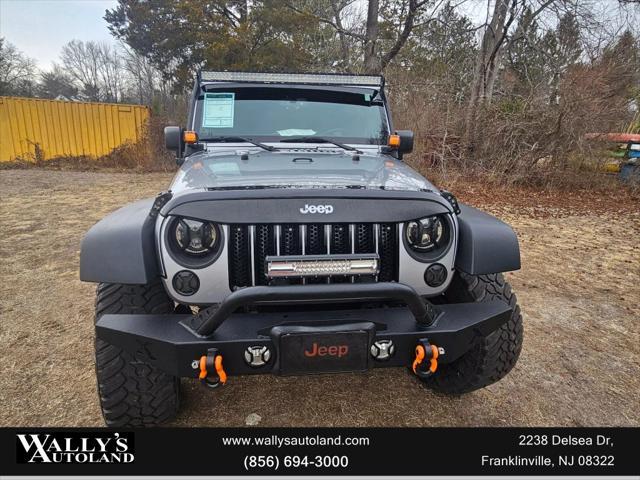 used 2013 Jeep Wrangler Unlimited car, priced at $13,995