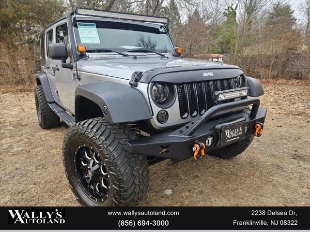 used 2013 Jeep Wrangler Unlimited car, priced at $13,995