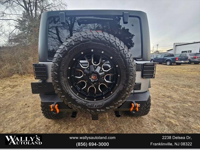 used 2013 Jeep Wrangler Unlimited car, priced at $13,995