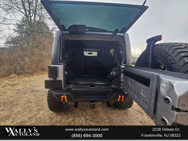 used 2013 Jeep Wrangler Unlimited car, priced at $13,995