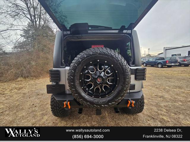 used 2013 Jeep Wrangler Unlimited car, priced at $13,995