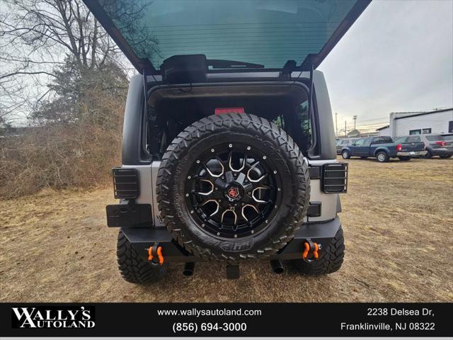 used 2013 Jeep Wrangler Unlimited car, priced at $13,995