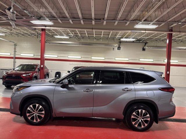 used 2021 Toyota Highlander Hybrid car, priced at $29,997