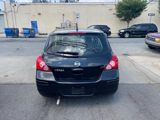 used 2009 Nissan Versa car, priced at $4,695