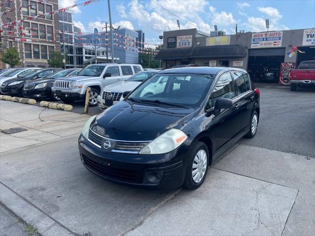 used 2009 Nissan Versa car, priced at $4,695