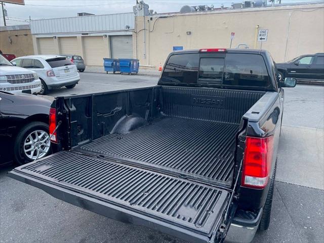 used 2005 Nissan Titan car, priced at $4,695