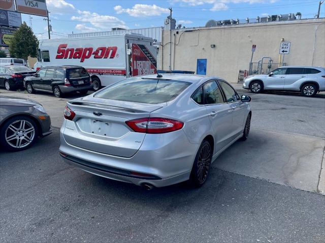 used 2016 Ford Fusion car, priced at $6,995