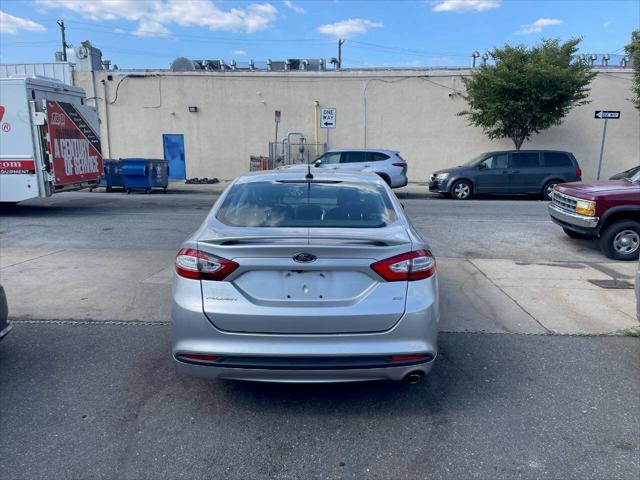 used 2016 Ford Fusion car, priced at $6,995