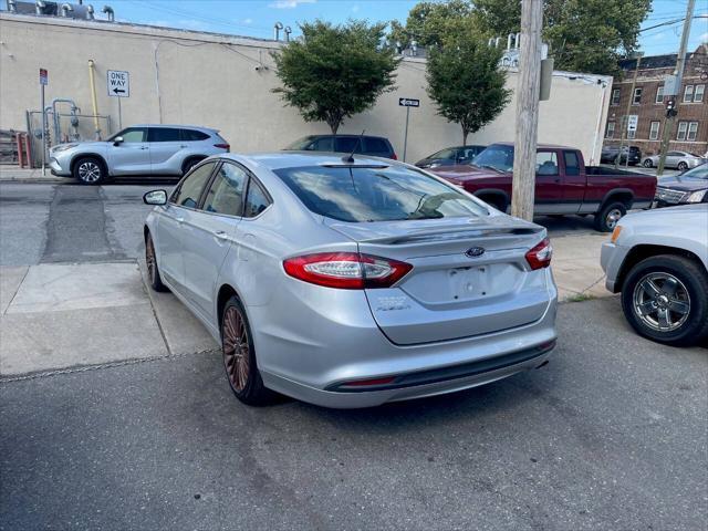 used 2016 Ford Fusion car, priced at $6,995