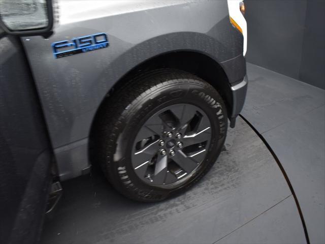 new 2025 Ford F-150 Lightning car, priced at $76,696