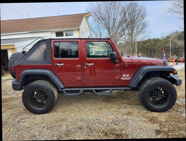 used 2009 Jeep Wrangler Unlimited car, priced at $9,995