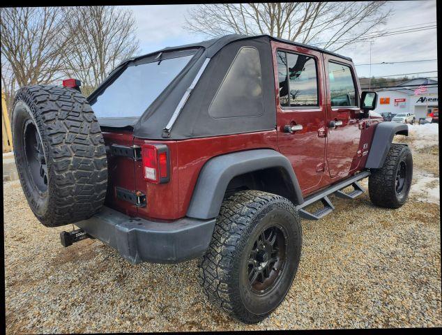 used 2009 Jeep Wrangler Unlimited car, priced at $9,995