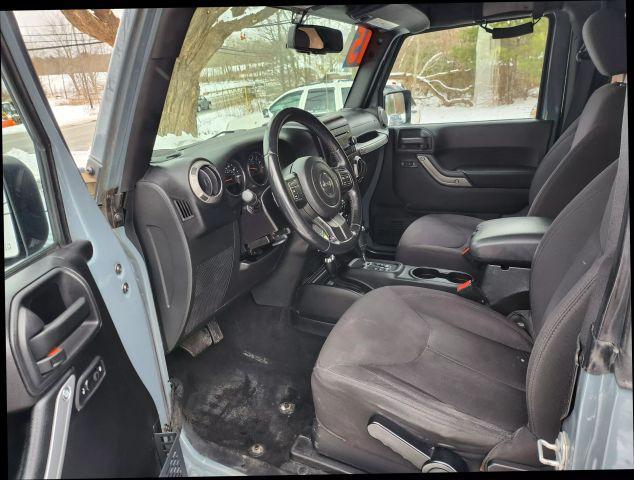 used 2015 Jeep Wrangler car, priced at $13,995