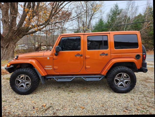 used 2011 Jeep Wrangler Unlimited car, priced at $15,995