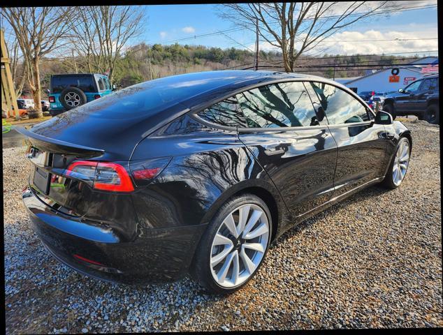 used 2021 Tesla Model 3 car, priced at $25,495