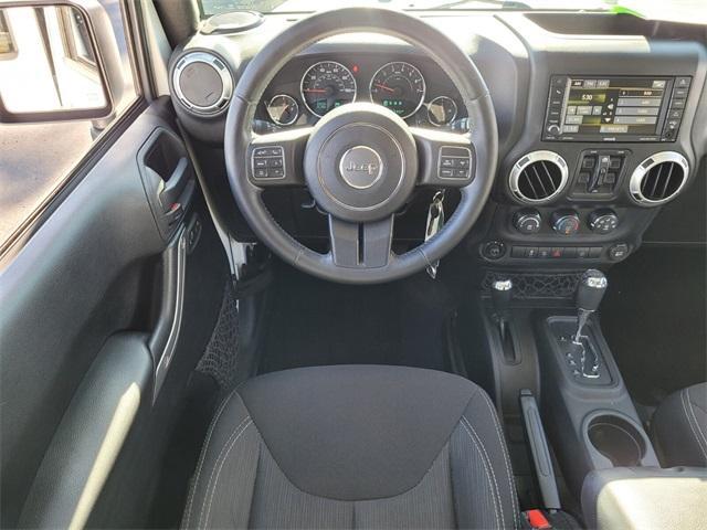 used 2015 Jeep Wrangler Unlimited car, priced at $19,900