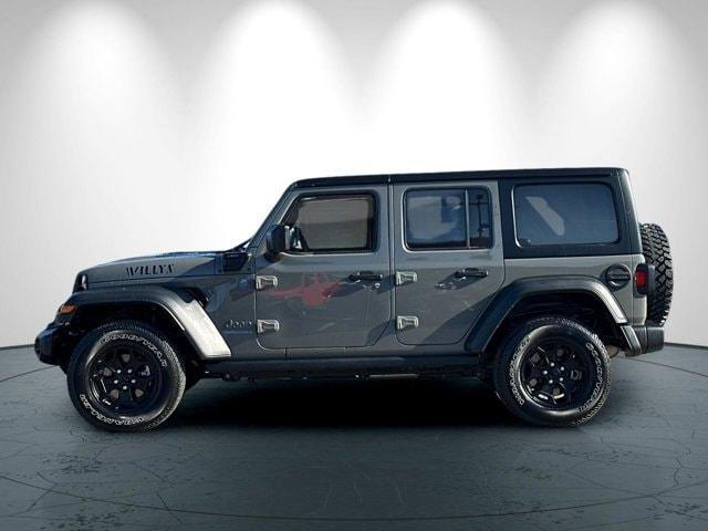 used 2023 Jeep Wrangler 4xe car, priced at $28,910