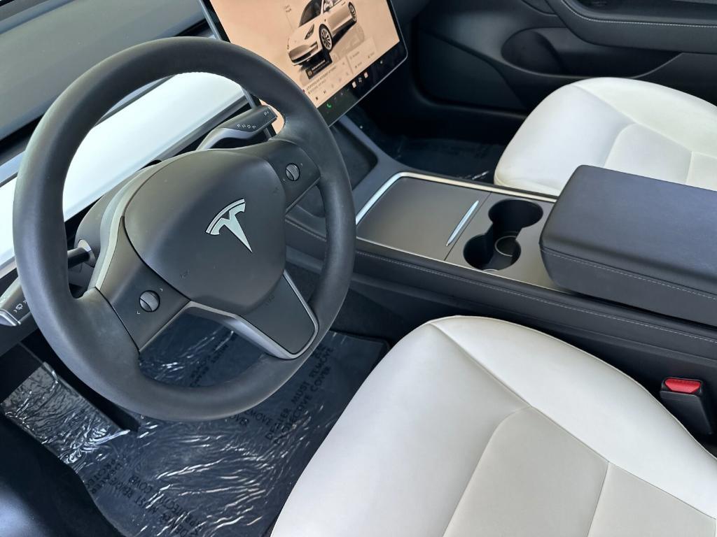 used 2022 Tesla Model 3 car, priced at $28,360