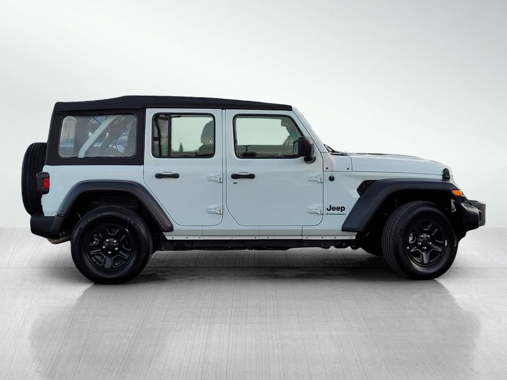 used 2023 Jeep Wrangler car, priced at $33,998