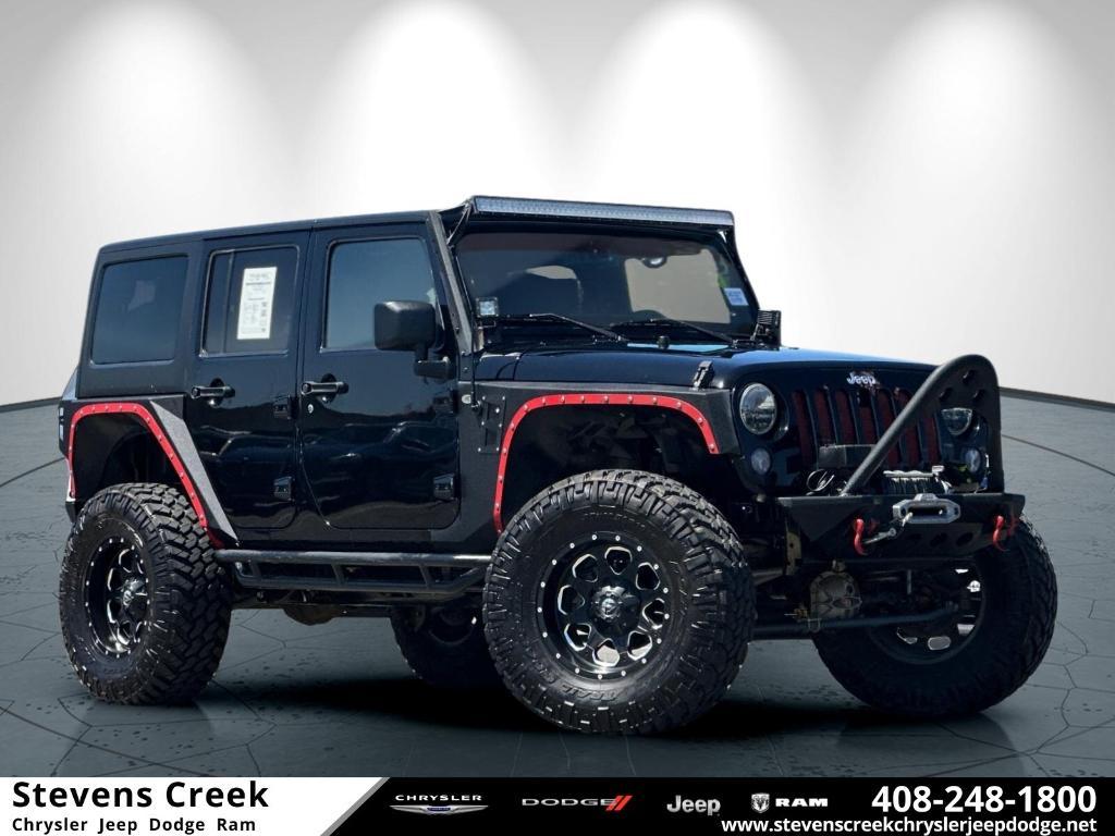 used 2014 Jeep Wrangler Unlimited car, priced at $26,998