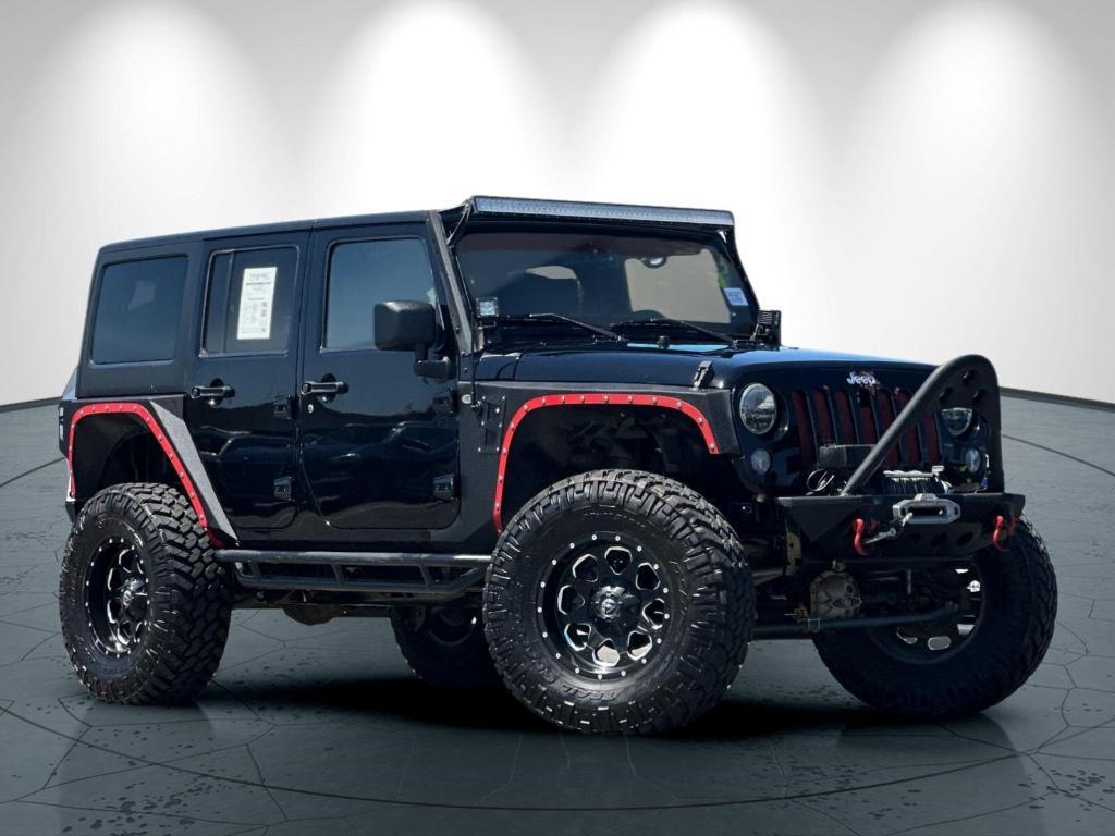 used 2014 Jeep Wrangler Unlimited car, priced at $26,998
