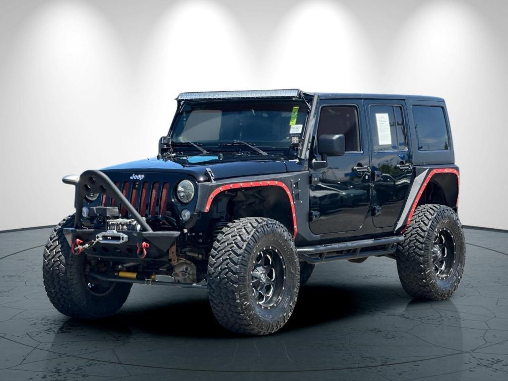used 2014 Jeep Wrangler Unlimited car, priced at $26,998