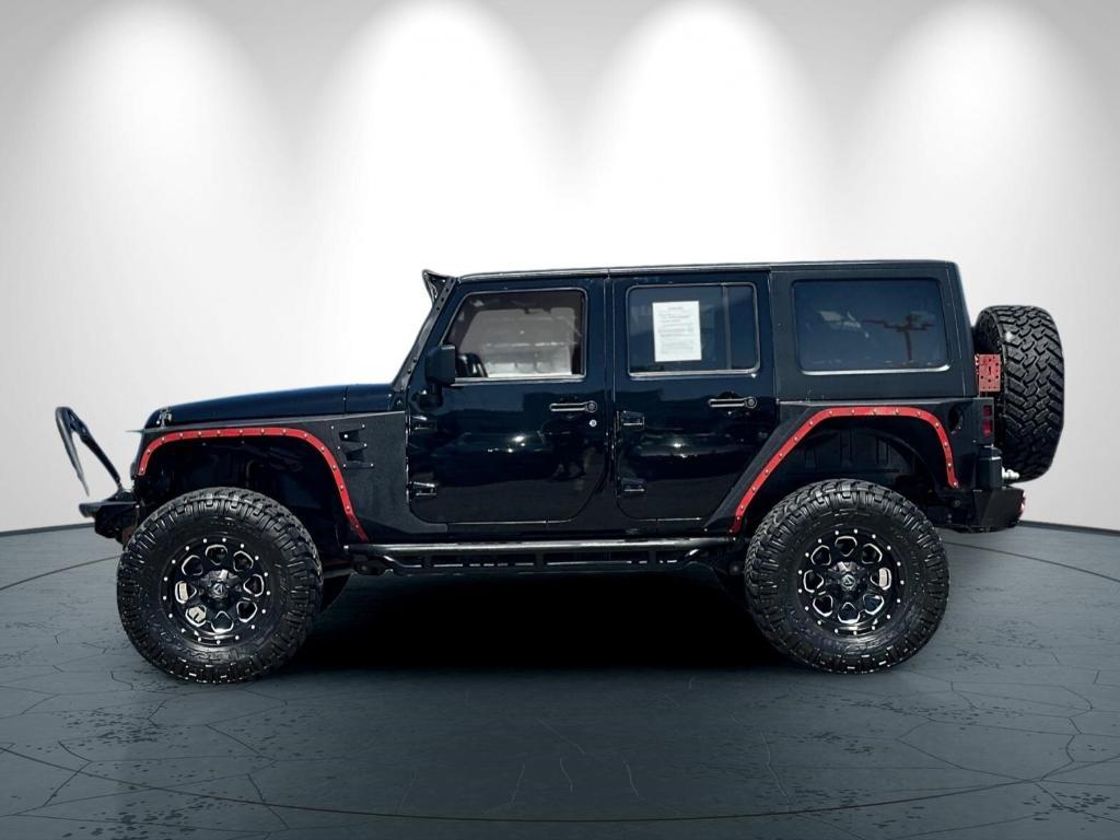 used 2014 Jeep Wrangler Unlimited car, priced at $26,998