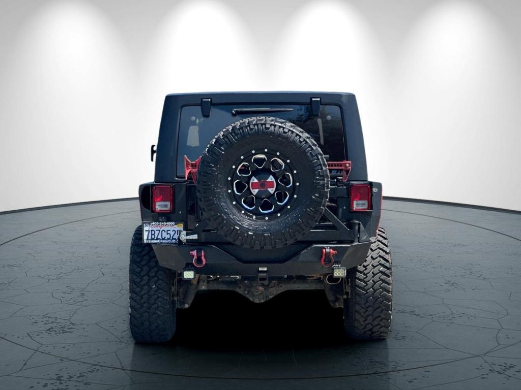 used 2014 Jeep Wrangler Unlimited car, priced at $26,998