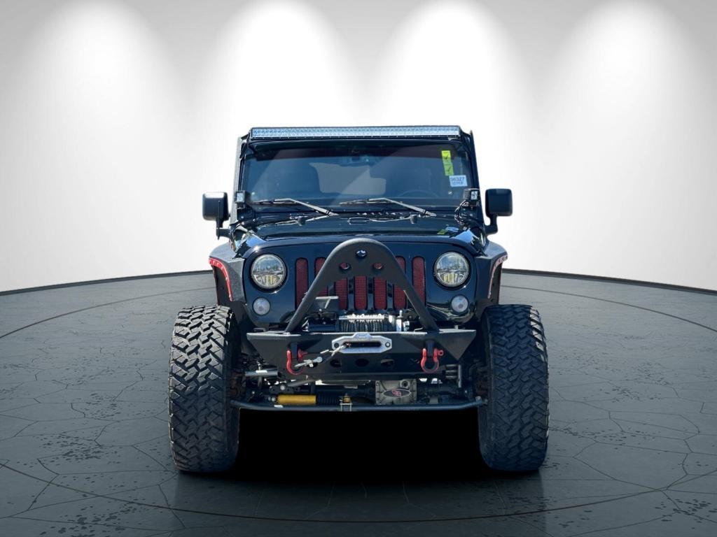 used 2014 Jeep Wrangler Unlimited car, priced at $26,998