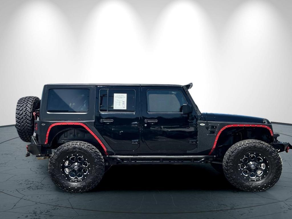 used 2014 Jeep Wrangler Unlimited car, priced at $26,998
