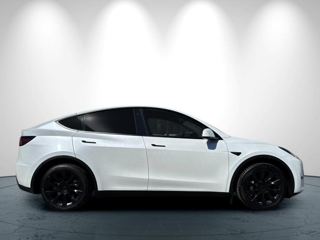 used 2023 Tesla Model Y car, priced at $34,533