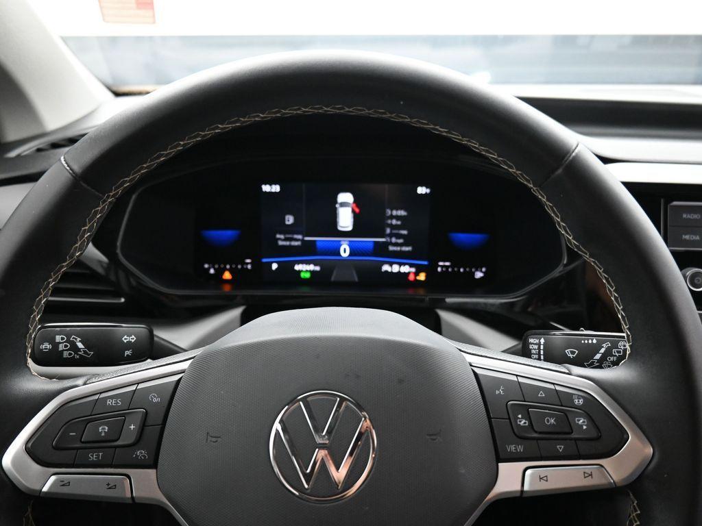 used 2023 Volkswagen Taos car, priced at $19,333