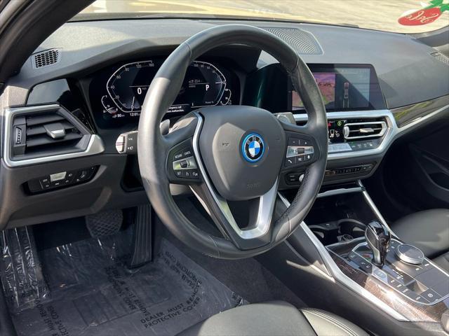 used 2022 BMW 330e car, priced at $29,438