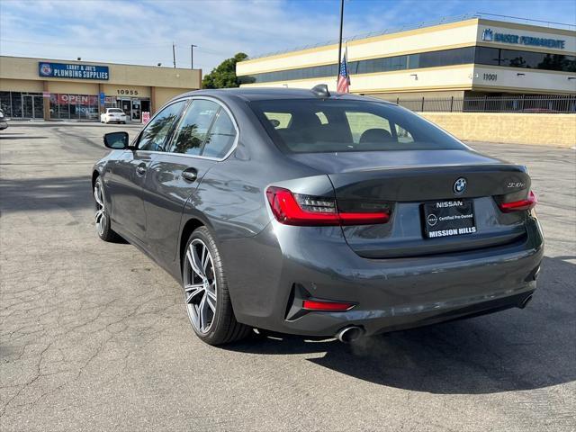 used 2022 BMW 330e car, priced at $29,438