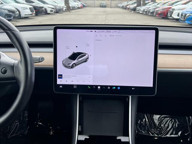 used 2018 Tesla Model 3 car, priced at $24,499