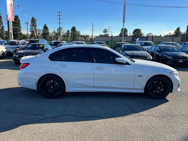 used 2022 BMW 330e car, priced at $28,178