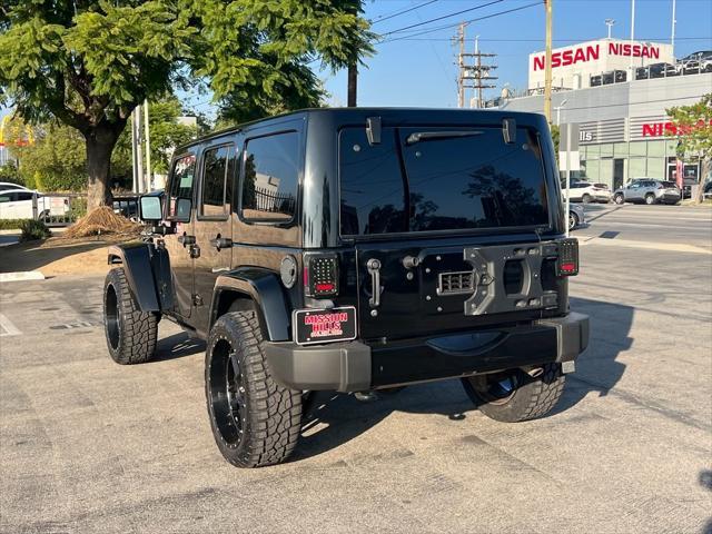 used 2018 Jeep Wrangler JK Unlimited car, priced at $26,566