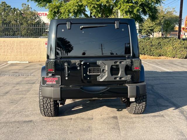 used 2018 Jeep Wrangler JK Unlimited car, priced at $26,566