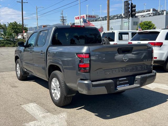 used 2022 Nissan Frontier car, priced at $26,995