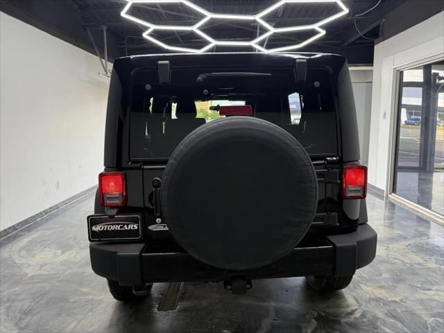 used 2012 Jeep Wrangler Unlimited car, priced at $14,900